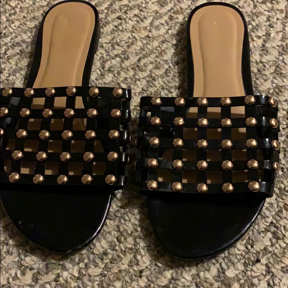 Black sandals with gold studs